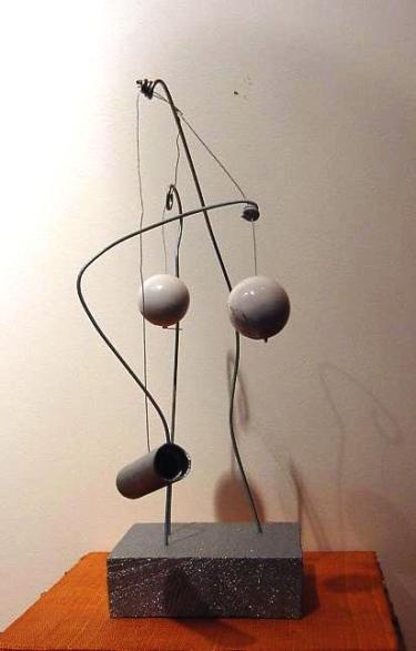 "Man" sculpture, constructed of wood, aluminum, monofilament.